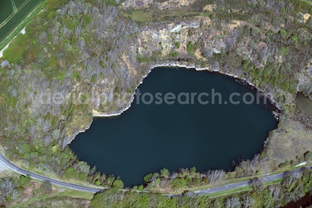 Aerial image Lourdoueix-Saint-Pierre - Unused renatured quarry with lake- Water in Lourdoueix-Saint-Pierre in Aquitaine Limousin Poitou-Charentes, France