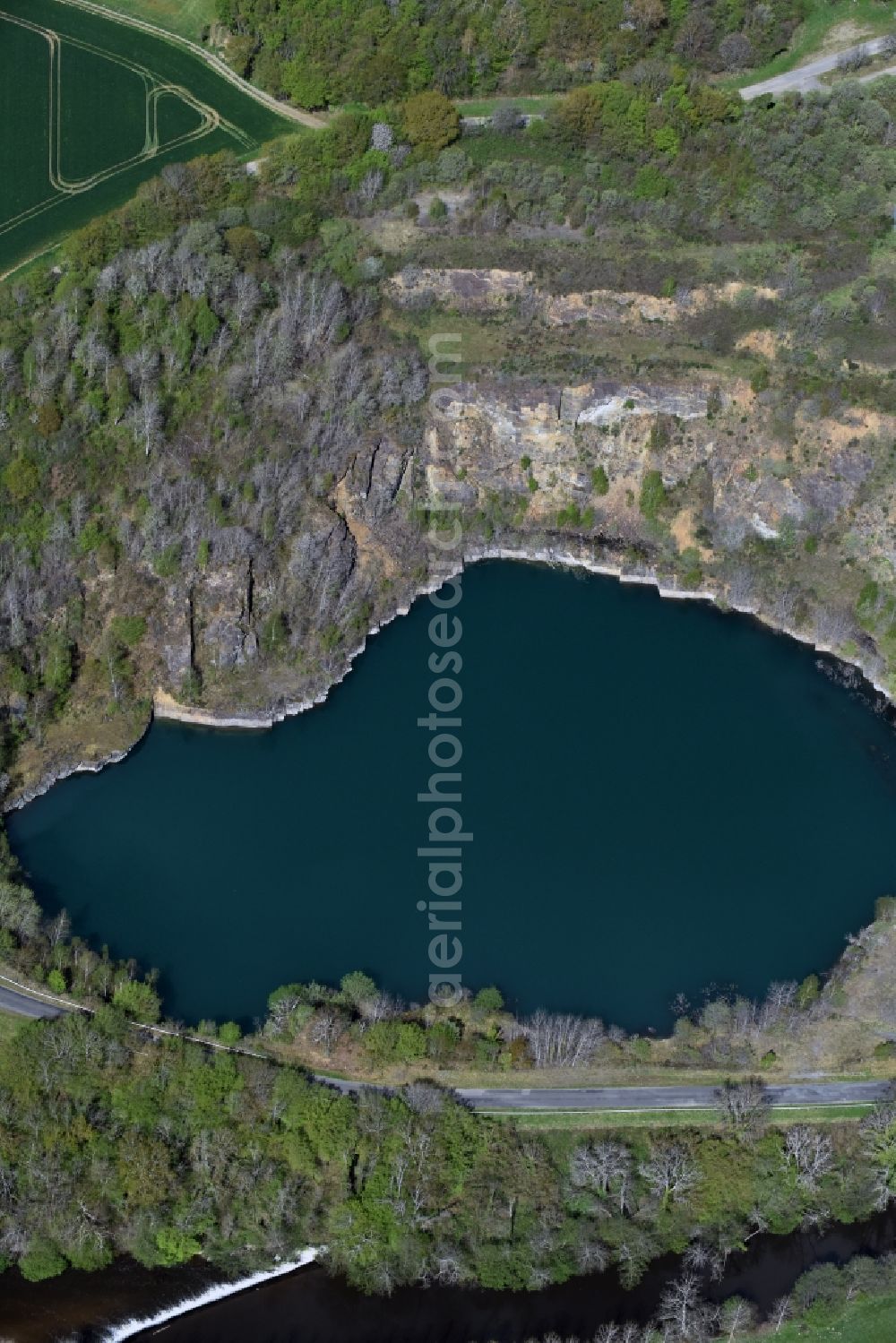 Lourdoueix-Saint-Pierre from the bird's eye view: Unused renatured quarry with lake- Water in Lourdoueix-Saint-Pierre in Aquitaine Limousin Poitou-Charentes, France