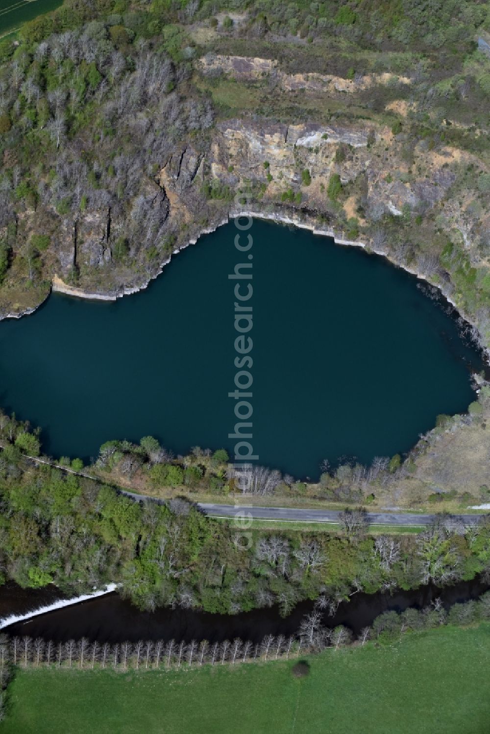 Aerial image Lourdoueix-Saint-Pierre - Unused renatured quarry with lake- Water in Lourdoueix-Saint-Pierre in Aquitaine Limousin Poitou-Charentes, France