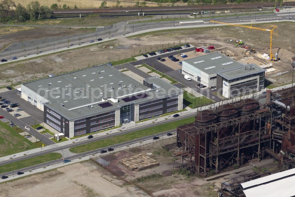 Aerial photograph Dortmund - View at the abandoned and monument protected blast furnace plant Phoenix West in the city district Hörde in Dortmund in the federal state North Rhine-Westphalia NRW.Under direction of the NRW.URBAN GmbH & Co. KG the area will build up as a technology and service location for future technologies