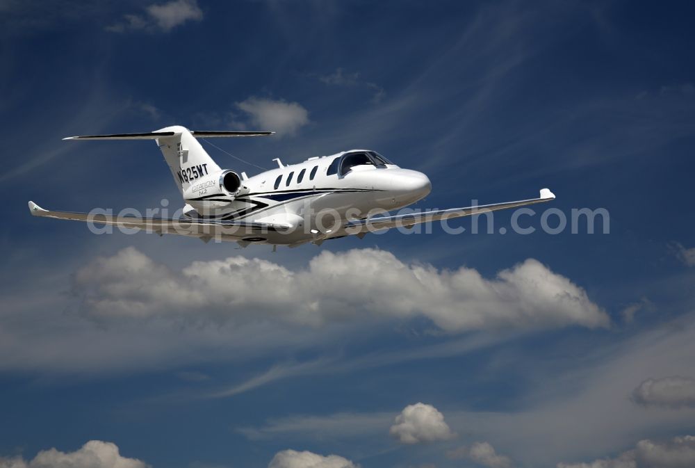 Aerial image Stuttgart - Jet aircraft jet Cessna Citation M2 with the US registration N825MT after the start of the airport in Stuttgart in Baden-Wuerttemberg