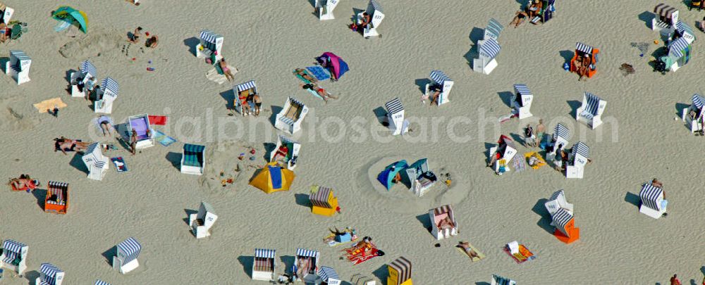 Aerial image Norderney - Blick auf den Strand von Norderney. Die Insel wurde schon 1797 zu einem Seebad ernannt. 2009 haben 451.000 Gäste die zweitgrößte Ostfriesische Insel besucht. Das entspricht ca. 3.100.000 Übernachtungen. View of the beach of Norderney. The island was named as a seaside resort in 1797. In 2009 451.000 guests visited the second largest East Frisian island. This corresponds to approximately 3.1 million nights.