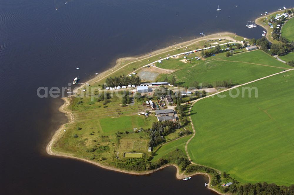 Aerial photograph Saalburg - Blick auf einem Strand und einer Slipanlage. Im Sommer findet hier seit mehreren Jahren das Sonne Mond Sterne Festival statt. Dies ist das größte Open-Air der Elektronischen Musik in Ostdeutschland