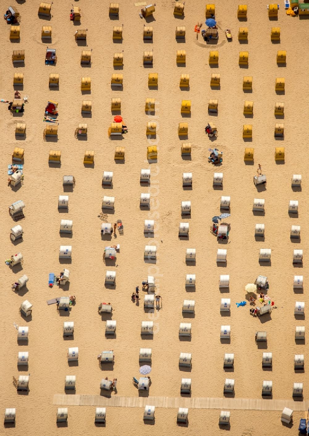 Lübeck from the bird's eye view: Beach chair on the sandy beach ranks in the coastal area of baltic sea near Travemuende in Luebeck in the state Schleswig-Holstein