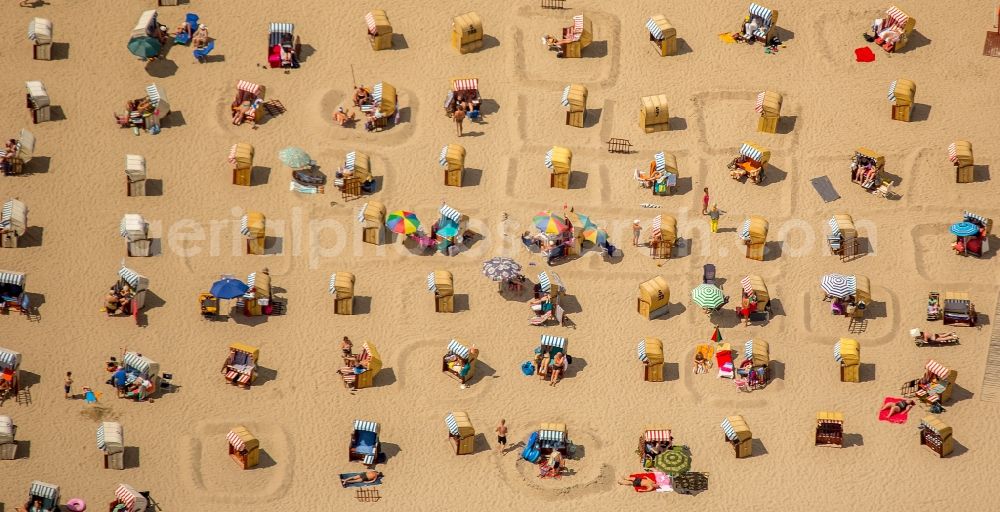 Lübeck from the bird's eye view: Beach chair on the sandy beach ranks in the coastal area of baltic sea near Travemuende in Luebeck in the state Schleswig-Holstein