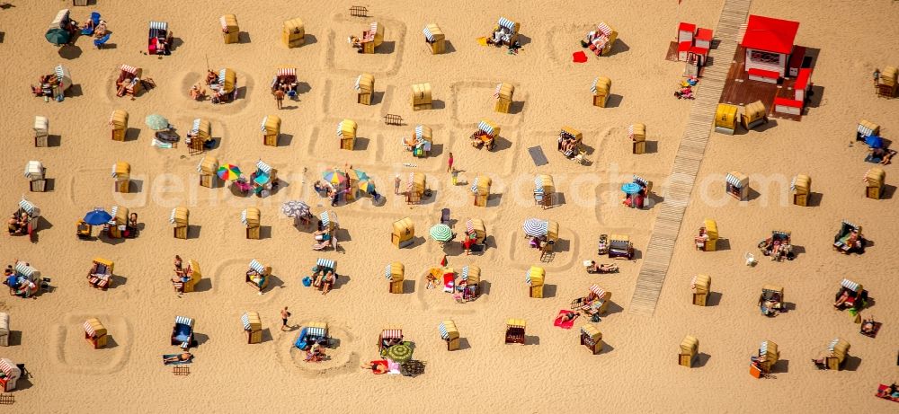 Aerial image Lübeck - Beach chair on the sandy beach ranks in the coastal area of baltic sea near Travemuende in Luebeck in the state Schleswig-Holstein