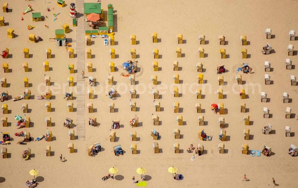 Lübeck from the bird's eye view: Beach chair on the sandy beach ranks in the coastal area of baltic sea near Travemuende in Luebeck in the state Schleswig-Holstein