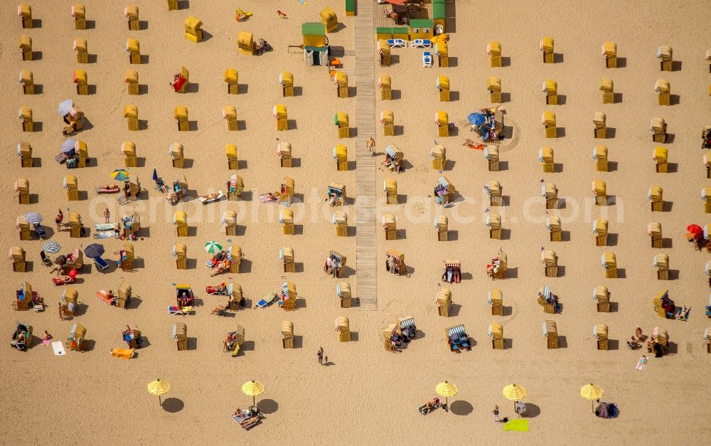 Aerial image Lübeck - Beach chair on the sandy beach ranks in the coastal area of baltic sea near Travemuende in Luebeck in the state Schleswig-Holstein