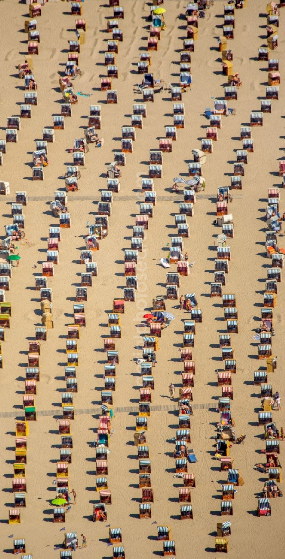 Lübeck from the bird's eye view: Beach chair on the sandy beach ranks in the coastal area of baltic sea near Travemuende in Luebeck in the state Schleswig-Holstein