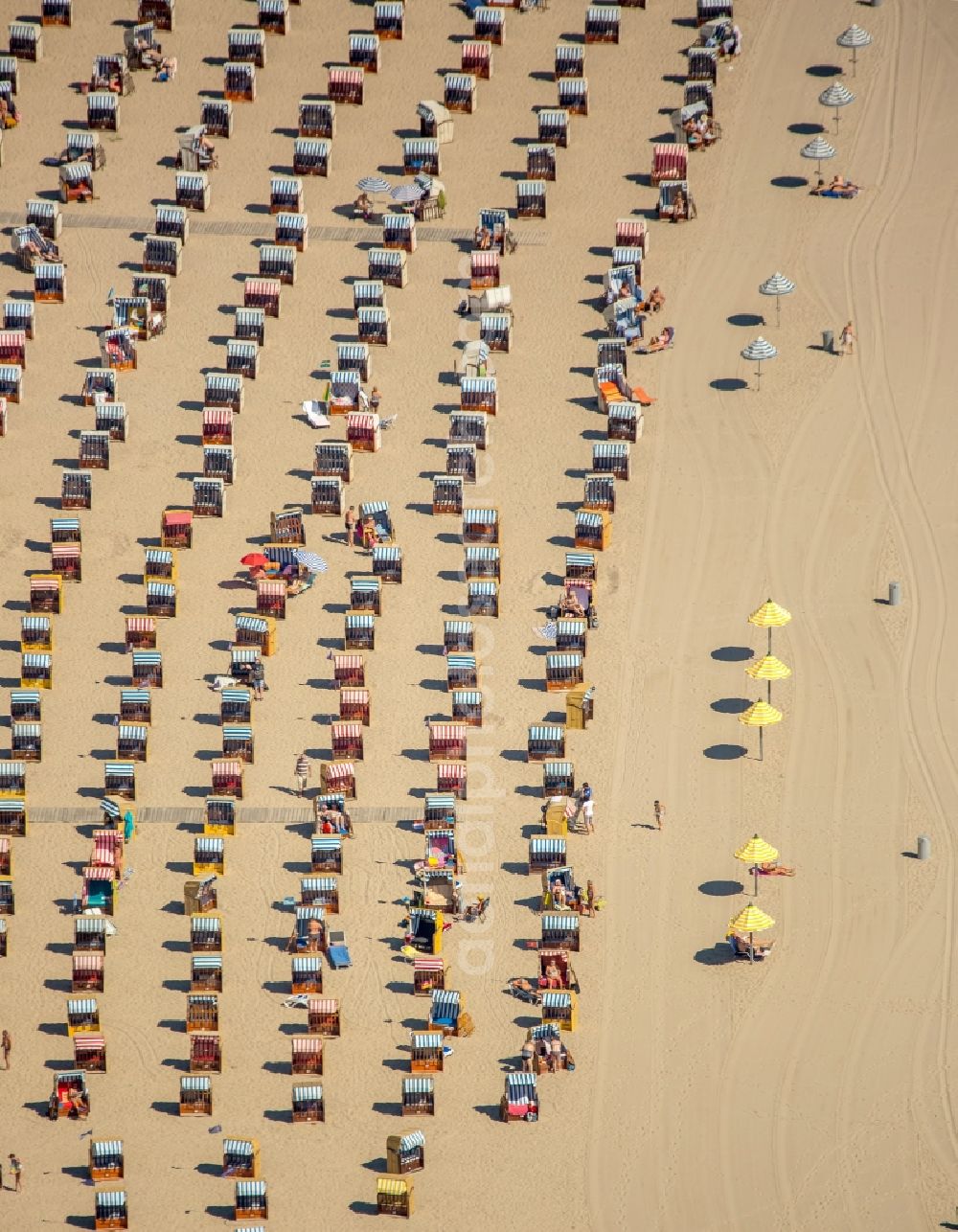 Aerial image Lübeck - Beach chair on the sandy beach ranks in the coastal area of baltic sea near Travemuende in Luebeck in the state Schleswig-Holstein