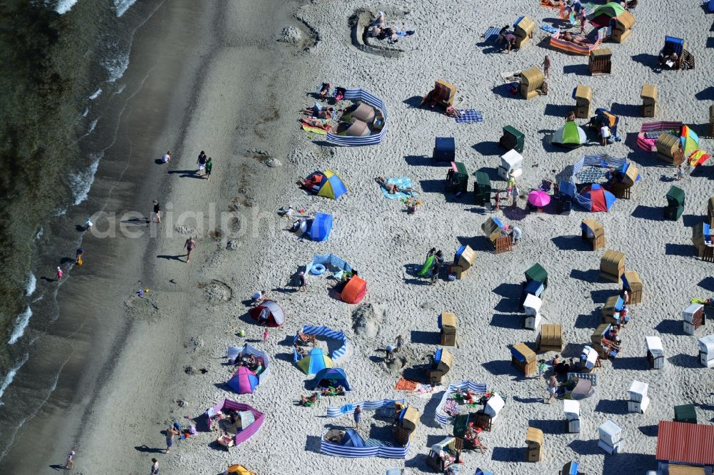 Aerial photograph Dierhagen - Beach chair on the sandy beach ranks in the coastal area of baltic see in Dierhagen in the state Mecklenburg - Western Pomerania