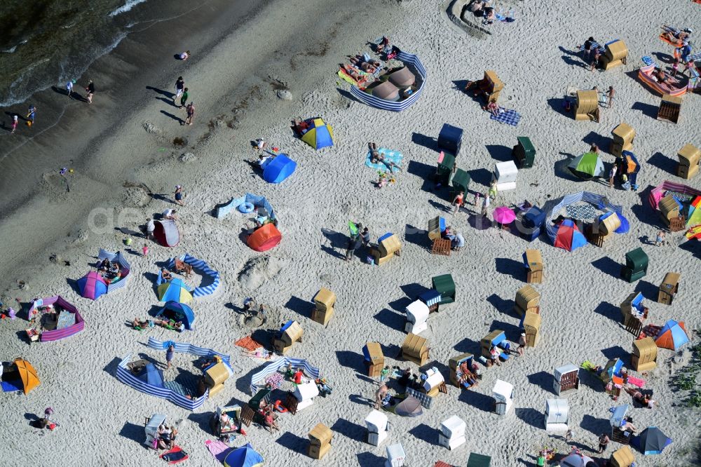 Dierhagen from the bird's eye view: Beach chair on the sandy beach ranks in the coastal area of baltic see in Dierhagen in the state Mecklenburg - Western Pomerania