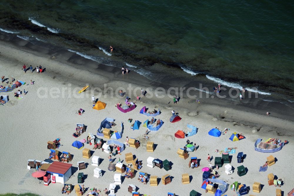 Aerial image Dierhagen - Beach chair on the sandy beach ranks in the coastal area of baltic see in Dierhagen in the state Mecklenburg - Western Pomerania