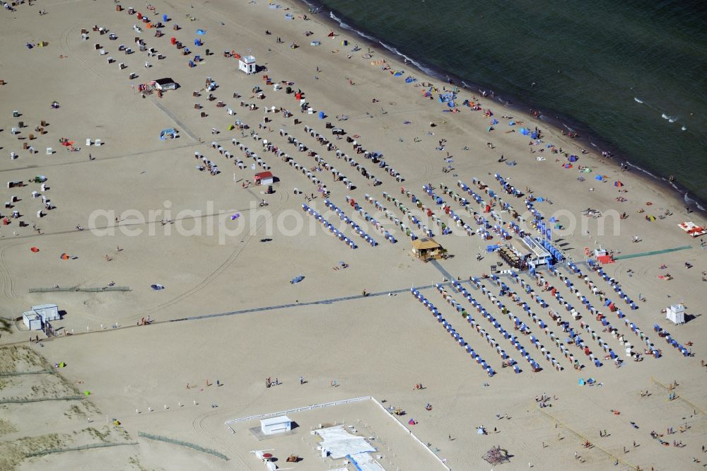 Rostock from the bird's eye view: Beach chair on the sandy beach ranks in the coastal area vom Seebad Warnemuende in Rostock in the state Mecklenburg - Western Pomerania