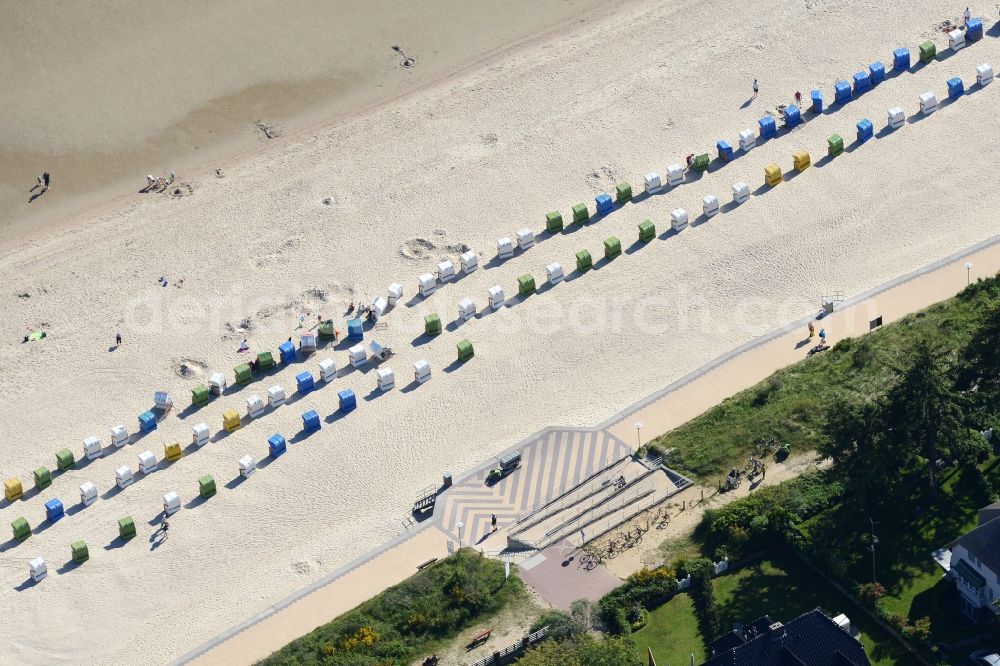 Wyk auf Föhr from the bird's eye view: Beach chair on the sandy beach ranks in the coastal area in Wyk auf Foehr in the state Schleswig-Holstein