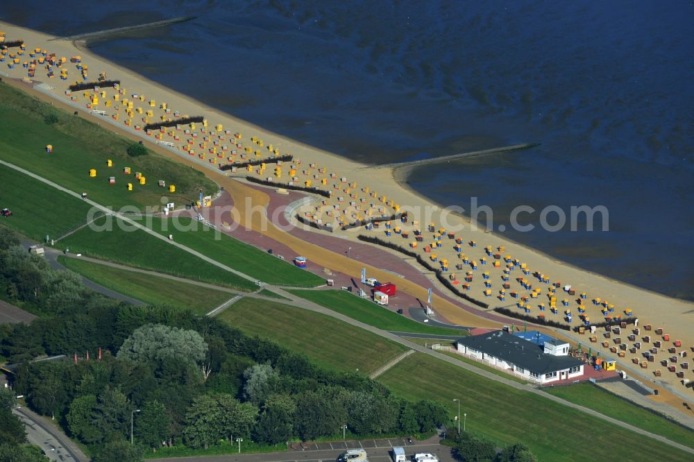 Cuxhaven from the bird's eye view: Beach chair on the beach of the North Sea coast rows ini Cuxhaven in Lower Saxony