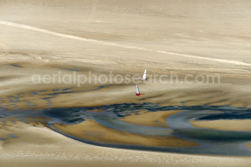 Sankt Peter-Ording from above - View of land sailors in Sankt Peter-Ording in the state of Schleswig-Holstein, Germany. The sailors sail on the beach