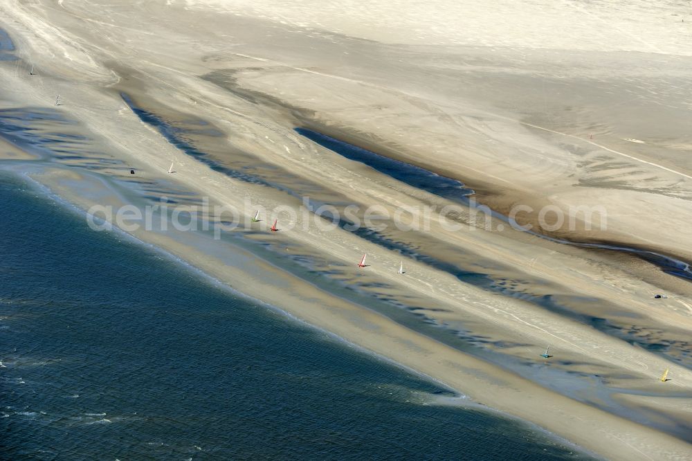 Sankt Peter-Ording from above - View of land sailors in Sankt Peter-Ording in the state of Schleswig-Holstein, Germany. The sailors sail on the beach