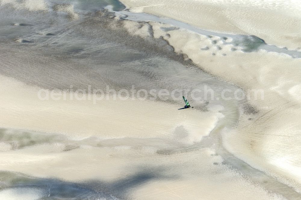 Sankt Peter-Ording from above - View of land sailors in Sankt Peter-Ording in the state of Schleswig-Holstein, Germany. The sailors sail on the beach