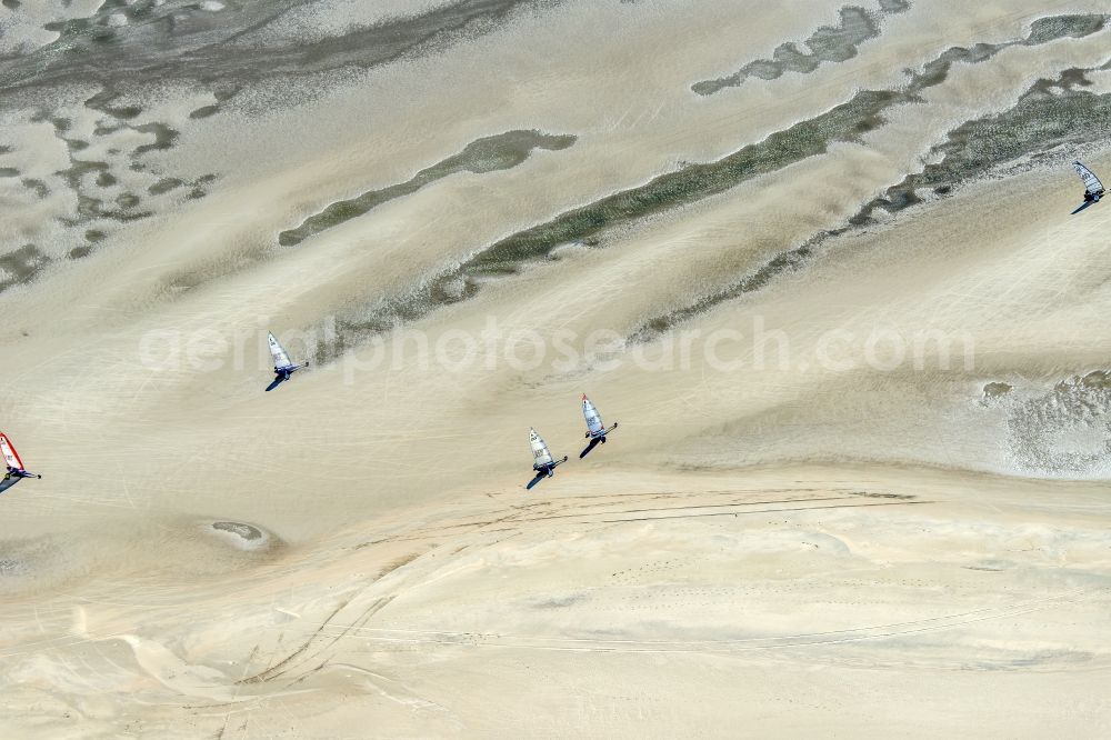 Aerial image Sankt Peter-Ording - View of land sailors in Sankt Peter-Ording in the state of Schleswig-Holstein, Germany. The sailors sail on the beach