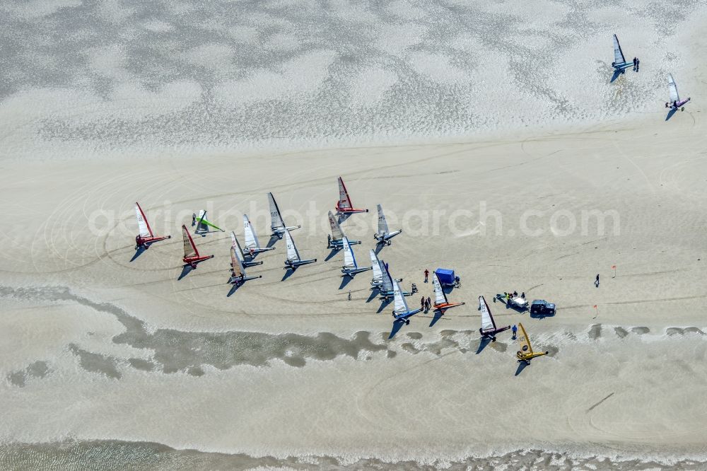 Sankt Peter-Ording from above - View of land sailors in Sankt Peter-Ording in the state of Schleswig-Holstein, Germany. The sailors sail on the beach