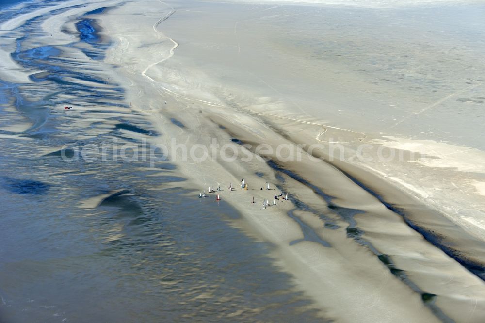 Aerial image Sankt Peter-Ording - View of land sailors in Sankt Peter-Ording in the state of Schleswig-Holstein, Germany. The sailors sail on the beach