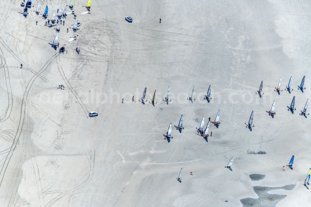 Sankt Peter-Ording from above - View of land sailors in Sankt Peter-Ording in the state of Schleswig-Holstein, Germany. The sailors sail on the beach