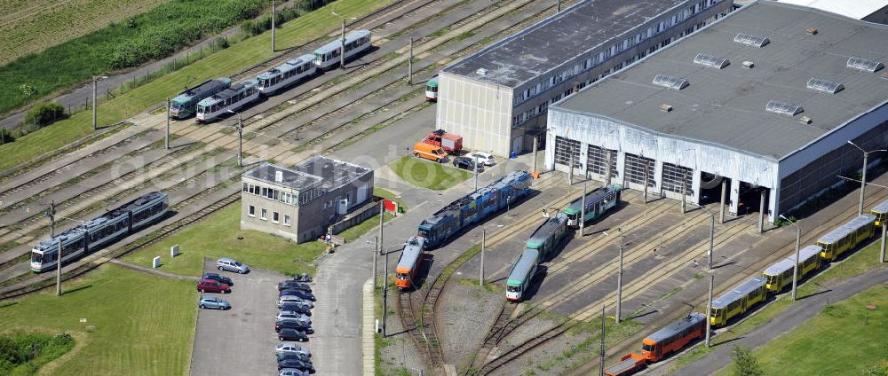 Aerial image Magdeburg - Blick auf den Betriebshof der MVB Magdeburger Verkehrsbetriebe / Straßenbahndepot am Deichwall im Gewerbegebiet Nord Magdeburg. View of the tram depot of the MVB transport in the industrial area north of Magdeburg.