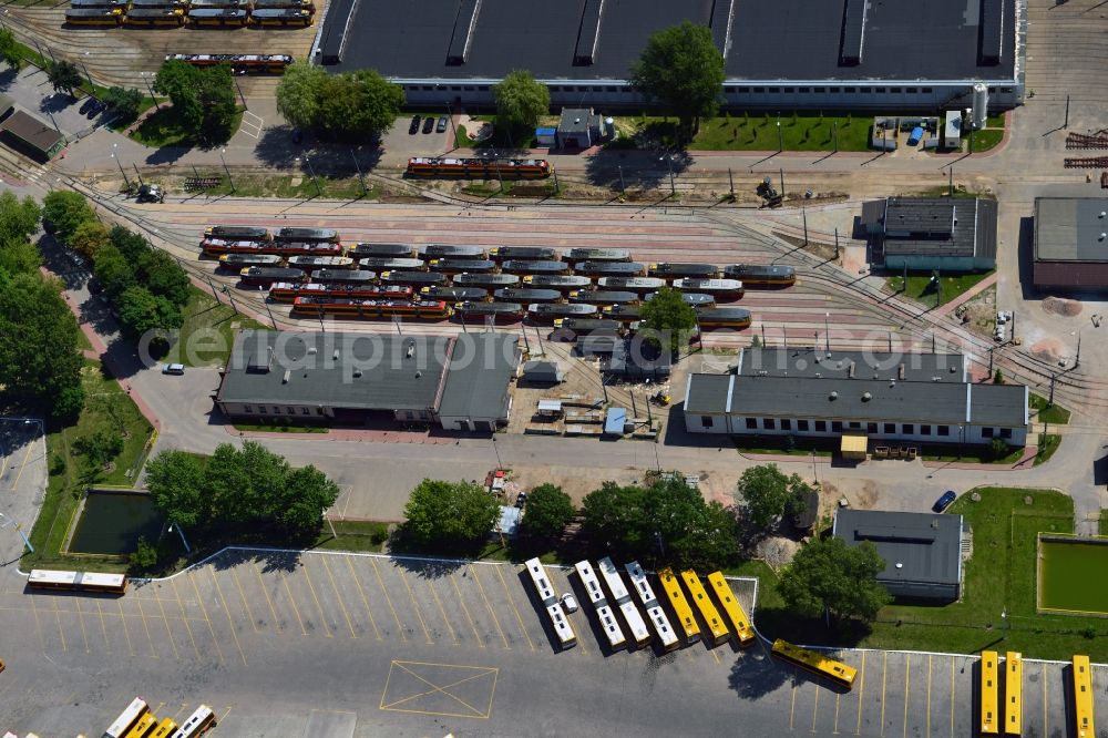 Aerial image Warschau - Streetcars at the garage in the Mokotow District in Warsaw in Poland. The depot with its workshops, halls and railways is located on Jana Pawla Woronicza street. It is located right next to the bus garage of the public transportation of Warsaw