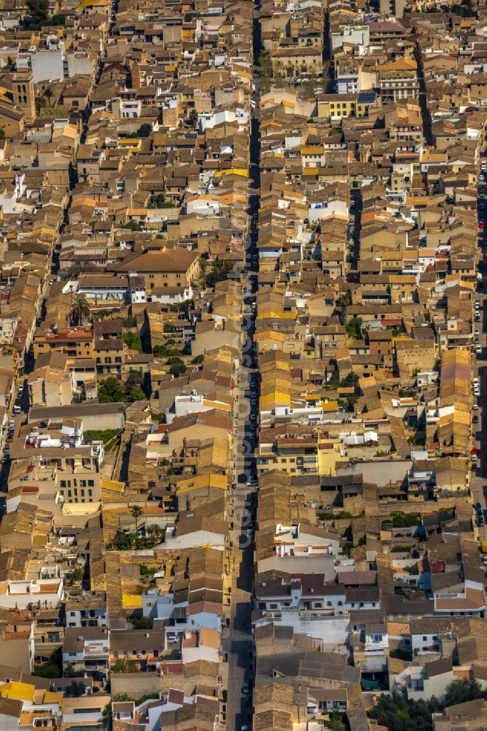 Aerial image Sa Pobla - Street guide of famous promenade and shopping street Carrer Crestatx in Sa Pobla in Balearic island of Mallorca, Spain