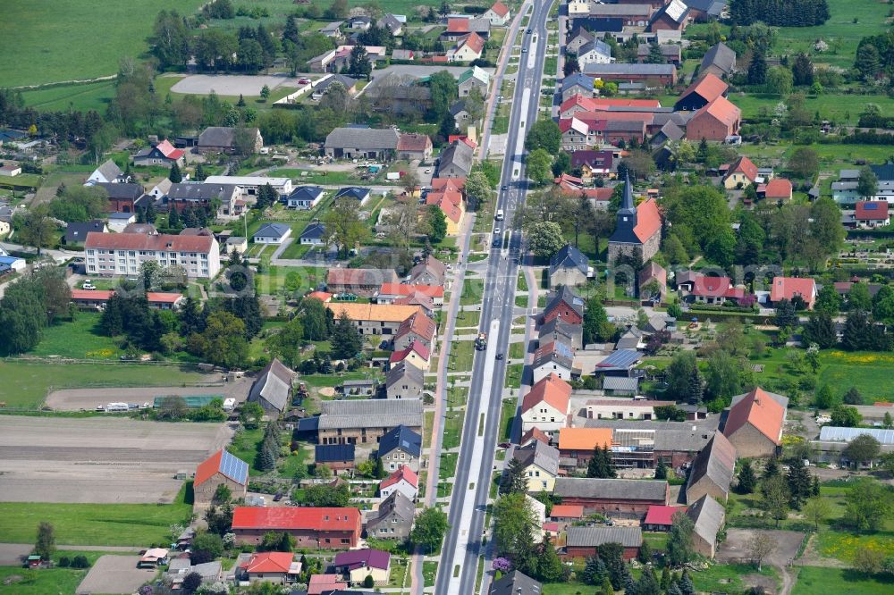 Dabergotz from the bird's eye view: Street - road guidance of Hauptstrasse in Dabergotz in the state Brandenburg, Germany