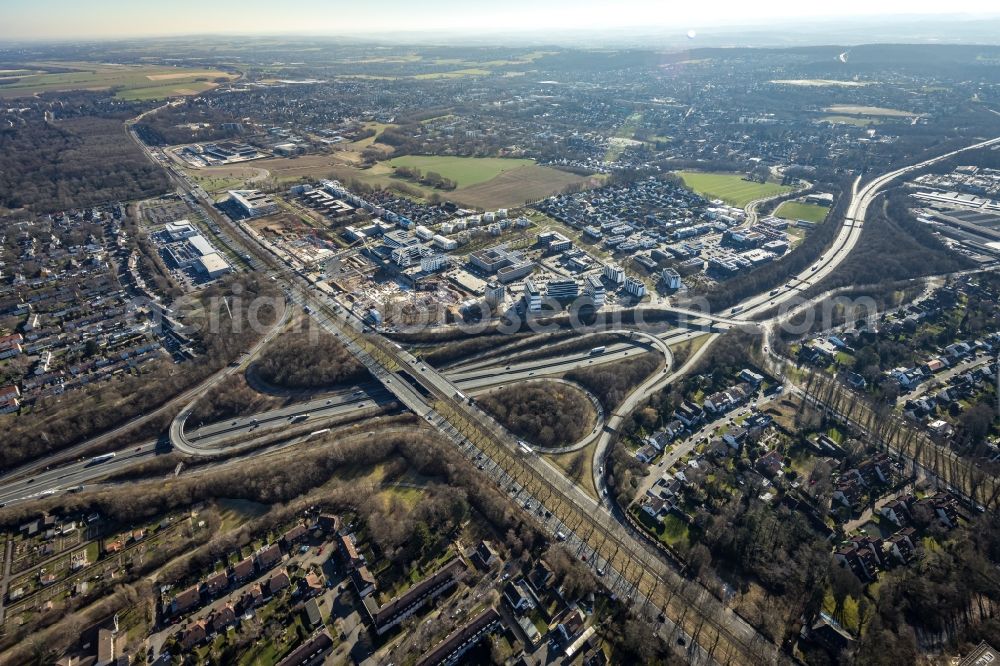 Dortmund from the bird's eye view: Looped street - road guidance of B1 - B236 and commercial area on Freie-Vogel-Strasse - Stockholmer Allee - Lisboner Allee in the district Gartenstadt-Sued in Dortmund in the state North Rhine-Westphalia, Germany