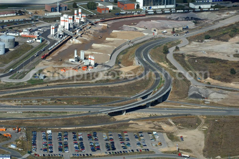 Schönefeld from above - Blick auf die Baustelle der neuen Straßenführung / Anbindung zum Flughafen Berlin-Schönefeld BBI (SXF) im Nordosten des Flughafengelände, bei Kienberg. Ausführende Firmen: Hochtief AG; EUROVIA Beton; PORR; BERGER Bau; Kark Weiss; Matthai; Schäler Bau Berlin GmbH; STRABAG; MAX BÖGL