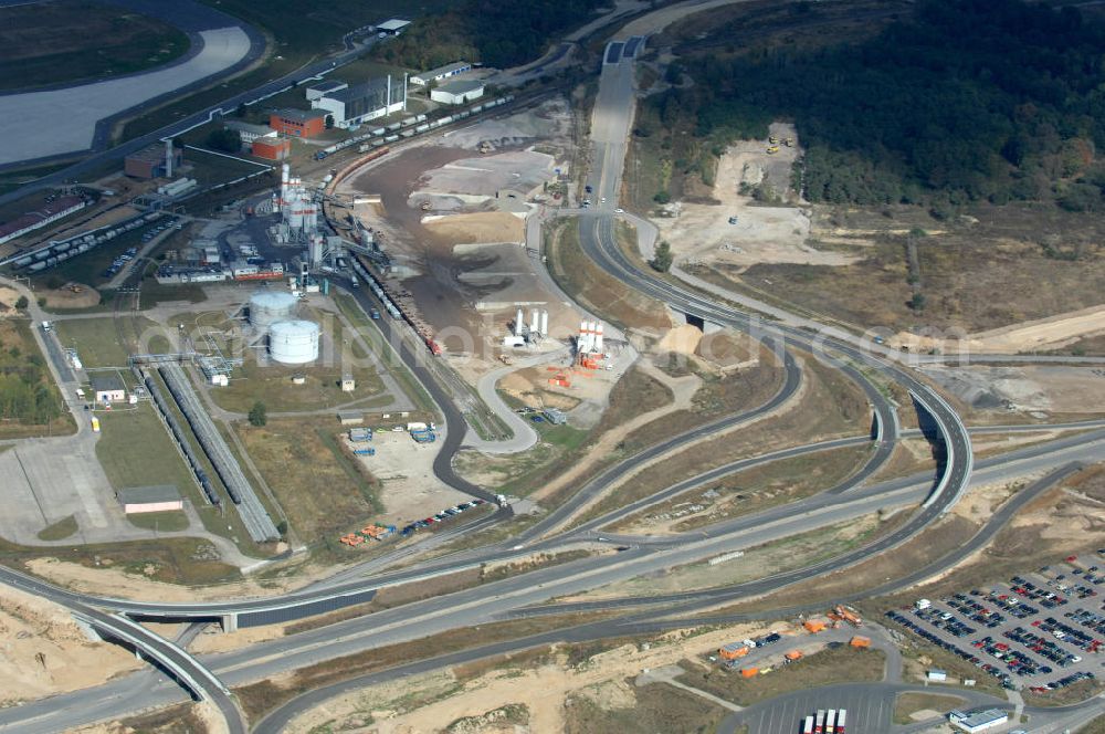 Aerial image Schönefeld - Blick auf die Baustelle der neuen Straßenführung / Anbindung zum Flughafen Berlin-Schönefeld BBI (SXF) im Nordosten des Flughafengelände, bei Kienberg. Ausführende Firmen: Hochtief AG; EUROVIA Beton; PORR; BERGER Bau; Kark Weiss; Matthai; Schäler Bau Berlin GmbH; STRABAG; MAX BÖGL