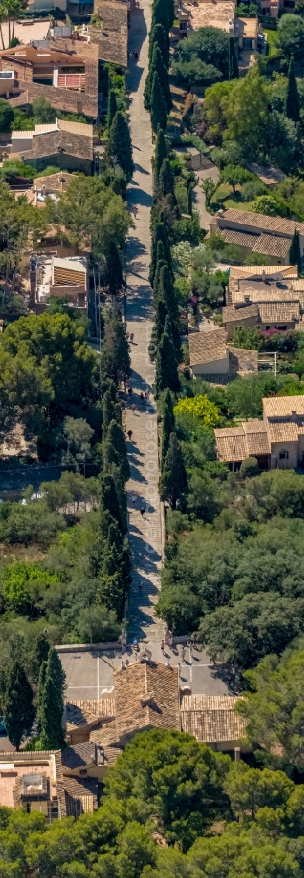 Pollenca from the bird's eye view: Street - road guidance to the Kapelle El Calvari on Carrer Sense nom in Pollenca in Balearic island of Mallorca, Spain