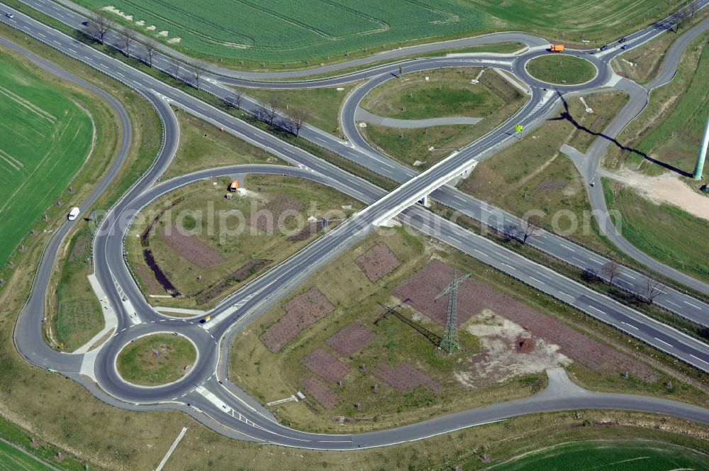 Aerial photograph NAUEN - Blick auf den Strassenverlauf der B273 Ortsumgehung Nauen. Sie unterliegt dem Zuständigkeitsbereich Landesbetrieb Straßenwesen Niederlassung West Hauptsitz Potsdam, Steinstraße 104-106, 14480 Potsdam, Tel. +49(0)331 2334-0, Fax +49(0)331 2334-282, E-Mail: p.poststellels@ls.brandenburg.de; Die Projektsteuerung erfolgt durch Schüßler Plan Ingenieurgesellschaft mbH, Greifswalder Straße 80 A, 10405 Berlin, Tel. +49(0)30 42106 0, E-Mail: berlin@schuessler-plan.de