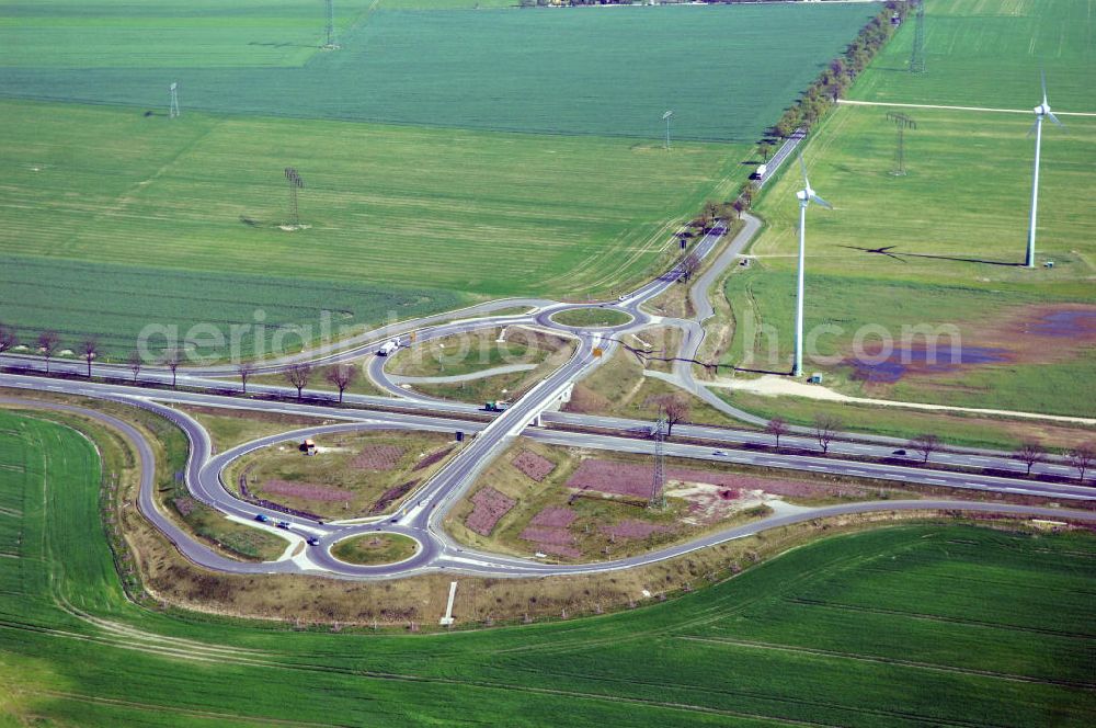 Aerial photograph NAUEN - Blick auf den Strassenverlauf der B273 Ortsumgehung Nauen. Sie unterliegt dem Zuständigkeitsbereich Landesbetrieb Straßenwesen Niederlassung West Hauptsitz Potsdam, Steinstraße 104-106, 14480 Potsdam, Tel. +49(0)331 2334-0, Fax +49(0)331 2334-282, E-Mail: p.poststellels@ls.brandenburg.de; Die Projektsteuerung erfolgt durch Schüßler Plan Ingenieurgesellschaft mbH, Greifswalder Straße 80 A, 10405 Berlin, Tel. +49(0)30 42106 0, E-Mail: berlin@schuessler-plan.de