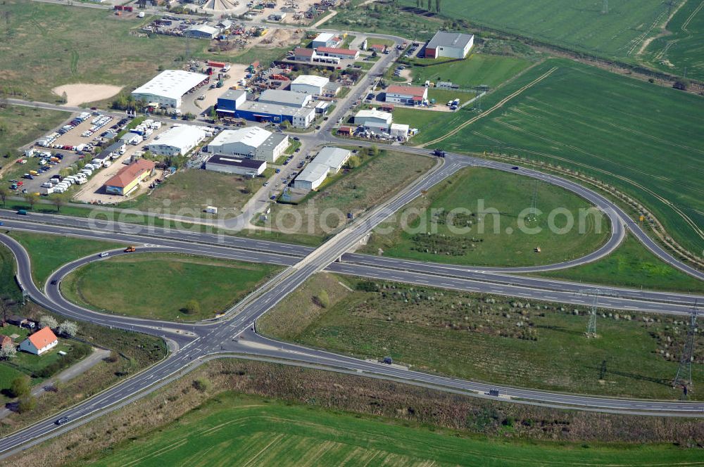 Aerial photograph NAUEN - Blick auf den Strassenverlauf der B273 Ortsumgehung Nauen. Sie unterliegt dem Zuständigkeitsbereich Landesbetrieb Straßenwesen Niederlassung West Hauptsitz Potsdam, Steinstraße 104-106, 14480 Potsdam, Tel. +49(0)331 2334-0, Fax +49(0)331 2334-282, E-Mail: p.poststellels@ls.brandenburg.de; Die Projektsteuerung erfolgt durch Schüßler Plan Ingenieurgesellschaft mbH, Greifswalder Straße 80 A, 10405 Berlin, Tel. +49(0)30 42106 0, E-Mail: berlin@schuessler-plan.de