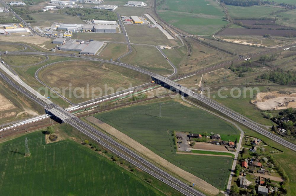 Aerial photograph WUSTERMARK - Blick auf den Strassenverlauf der B5 Ortsumgehung Wustermark. Sie unterliegt dem Zuständigkeitsbereich Landesbetrieb Straßenwesen Niederlassung West Hauptsitz Potsdam, Steinstraße 104-106, 14480 Potsdam, Tel. +49(0)331 2334-0, Fax +49(0)331 2334-282, E-Mail: p.poststellels@ls.brandenburg.de; Die Projektsteuerung erfolgt durch Schüßler Plan Ingenieurgesellschaft mbH, Greifswalder Straße 80 A, 10405 Berlin, Tel. +49(0)30 42106 0, E-Mail: berlin@schuessler-plan.de