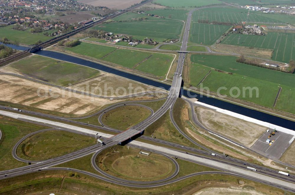 Aerial image WUSTERMARK - Blick auf den Strassenverlauf der B5 Ortsumgehung Wustermark. Sie unterliegt dem Zuständigkeitsbereich Landesbetrieb Straßenwesen Niederlassung West Hauptsitz Potsdam, Steinstraße 104-106, 14480 Potsdam, Tel. +49(0)331 2334-0, Fax +49(0)331 2334-282, E-Mail: p.poststellels@ls.brandenburg.de; Die Projektsteuerung erfolgt durch Schüßler Plan Ingenieurgesellschaft mbH, Greifswalder Straße 80 A, 10405 Berlin, Tel. +49(0)30 42106 0, E-Mail: berlin@schuessler-plan.de