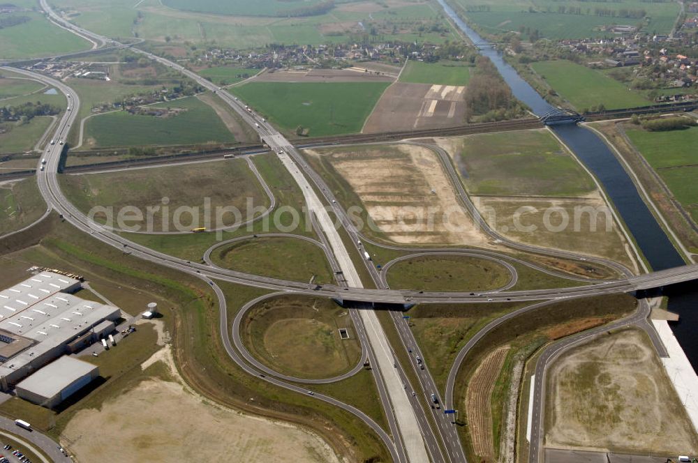 Aerial photograph WUSTERMARK - Blick auf den Strassenverlauf der B5 Ortsumgehung Wustermark. Sie unterliegt dem Zuständigkeitsbereich Landesbetrieb Straßenwesen Niederlassung West Hauptsitz Potsdam, Steinstraße 104-106, 14480 Potsdam, Tel. +49(0)331 2334-0, Fax +49(0)331 2334-282, E-Mail: p.poststellels@ls.brandenburg.de; Die Projektsteuerung erfolgt durch Schüßler Plan Ingenieurgesellschaft mbH, Greifswalder Straße 80 A, 10405 Berlin, Tel. +49(0)30 42106 0, E-Mail: berlin@schuessler-plan.de