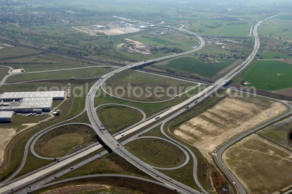 WUSTERMARK from the bird's eye view: Blick auf den Strassenverlauf der B5 Ortsumgehung Wustermark. Sie unterliegt dem Zuständigkeitsbereich Landesbetrieb Straßenwesen Niederlassung West Hauptsitz Potsdam, Steinstraße 104-106, 14480 Potsdam, Tel. +49(0)331 2334-0, Fax +49(0)331 2334-282, E-Mail: p.poststellels@ls.brandenburg.de; Die Projektsteuerung erfolgt durch Schüßler Plan Ingenieurgesellschaft mbH, Greifswalder Straße 80 A, 10405 Berlin, Tel. +49(0)30 42106 0, E-Mail: berlin@schuessler-plan.de