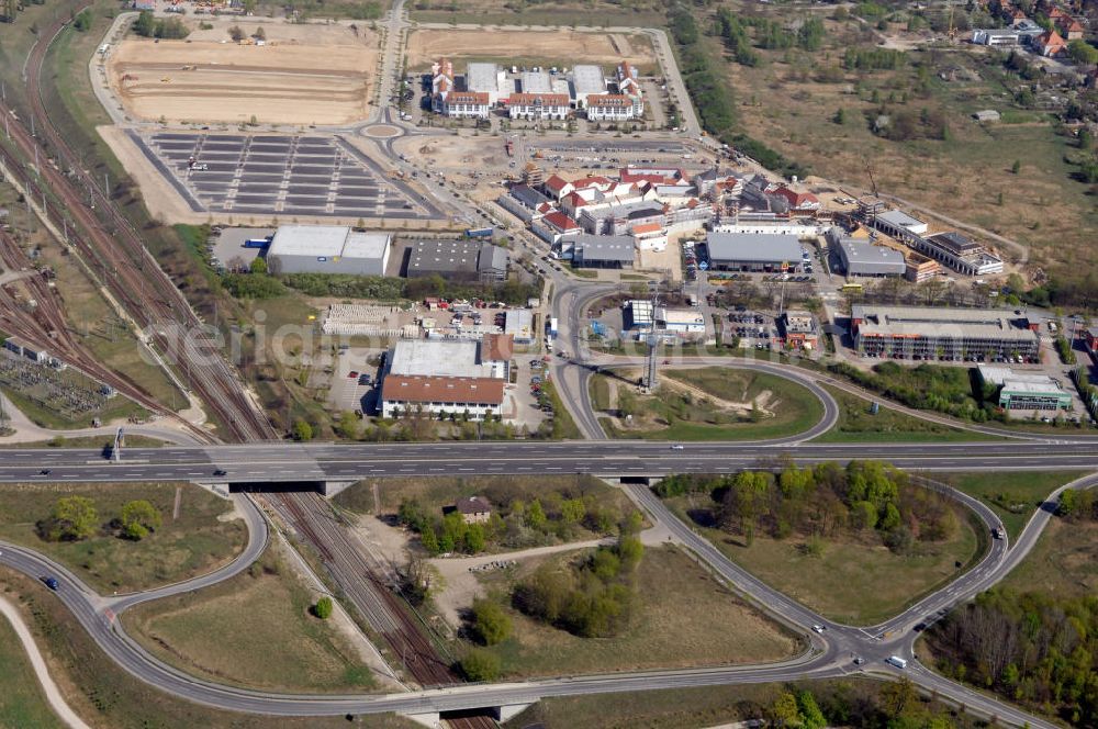 Aerial photograph WUSTERMARK - Blick auf den Strassenverlauf der B5 Ortsumgehung Wustermark. Sie unterliegt dem Zuständigkeitsbereich Landesbetrieb Straßenwesen Niederlassung West Hauptsitz Potsdam, Steinstraße 104-106, 14480 Potsdam, Tel. +49(0)331 2334-0, Fax +49(0)331 2334-282, E-Mail: p.poststellels@ls.brandenburg.de; Die Projektsteuerung erfolgt durch Schüßler Plan Ingenieurgesellschaft mbH, Greifswalder Straße 80 A, 10405 Berlin, Tel. +49(0)30 42106 0, E-Mail: berlin@schuessler-plan.de