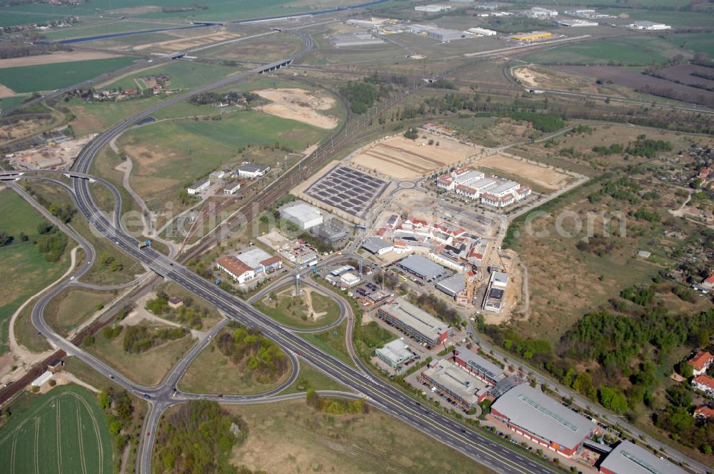 WUSTERMARK from the bird's eye view: Blick auf den Strassenverlauf der B5 Ortsumgehung Wustermark. Sie unterliegt dem Zuständigkeitsbereich Landesbetrieb Straßenwesen Niederlassung West Hauptsitz Potsdam, Steinstraße 104-106, 14480 Potsdam, Tel. +49(0)331 2334-0, Fax +49(0)331 2334-282, E-Mail: p.poststellels@ls.brandenburg.de; Die Projektsteuerung erfolgt durch Schüßler Plan Ingenieurgesellschaft mbH, Greifswalder Straße 80 A, 10405 Berlin, Tel. +49(0)30 42106 0, E-Mail: berlin@schuessler-plan.de