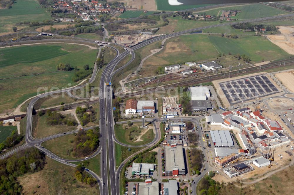 WUSTERMARK from above - Blick auf den Strassenverlauf der B5 Ortsumgehung Wustermark. Sie unterliegt dem Zuständigkeitsbereich Landesbetrieb Straßenwesen Niederlassung West Hauptsitz Potsdam, Steinstraße 104-106, 14480 Potsdam, Tel. +49(0)331 2334-0, Fax +49(0)331 2334-282, E-Mail: p.poststellels@ls.brandenburg.de; Die Projektsteuerung erfolgt durch Schüßler Plan Ingenieurgesellschaft mbH, Greifswalder Straße 80 A, 10405 Berlin, Tel. +49(0)30 42106 0, E-Mail: berlin@schuessler-plan.de