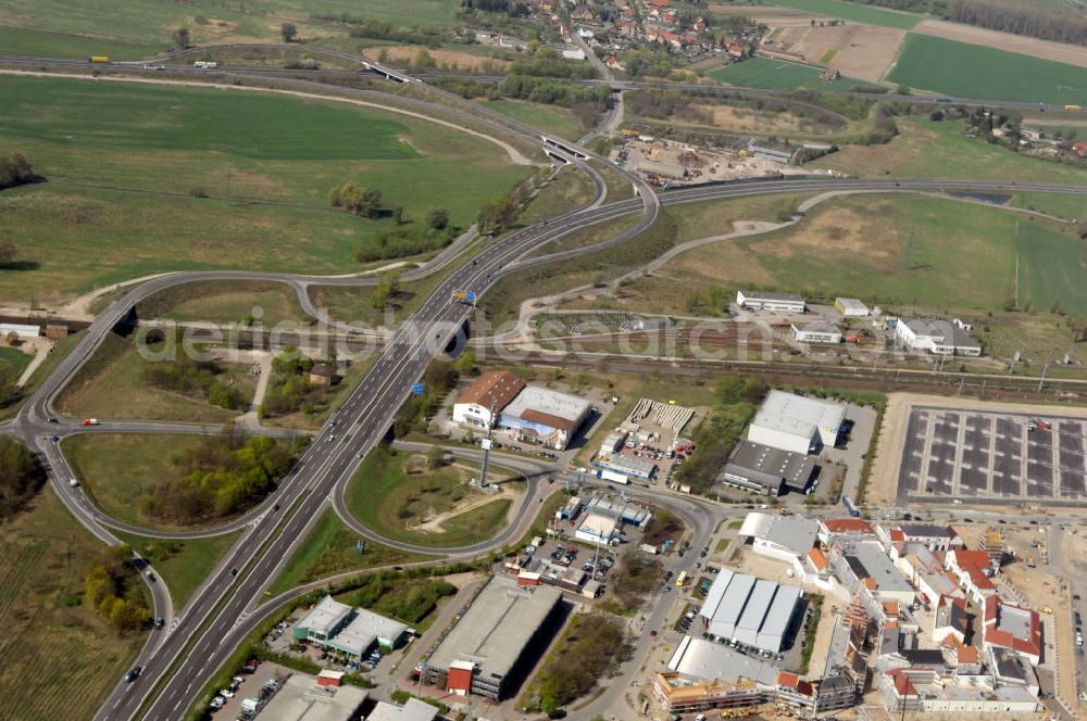 WUSTERMARK from the bird's eye view: Blick auf den Strassenverlauf der B5 Ortsumgehung Wustermark. Sie unterliegt dem Zuständigkeitsbereich Landesbetrieb Straßenwesen Niederlassung West Hauptsitz Potsdam, Steinstraße 104-106, 14480 Potsdam, Tel. +49(0)331 2334-0, Fax +49(0)331 2334-282, E-Mail: p.poststellels@ls.brandenburg.de; Die Projektsteuerung erfolgt durch Schüßler Plan Ingenieurgesellschaft mbH, Greifswalder Straße 80 A, 10405 Berlin, Tel. +49(0)30 42106 0, E-Mail: berlin@schuessler-plan.de