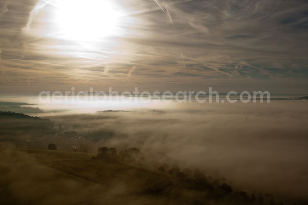 Lelleg from above - Power lines and pylons in morning mist in Lelleg in Grevenmacher, Luxembourg