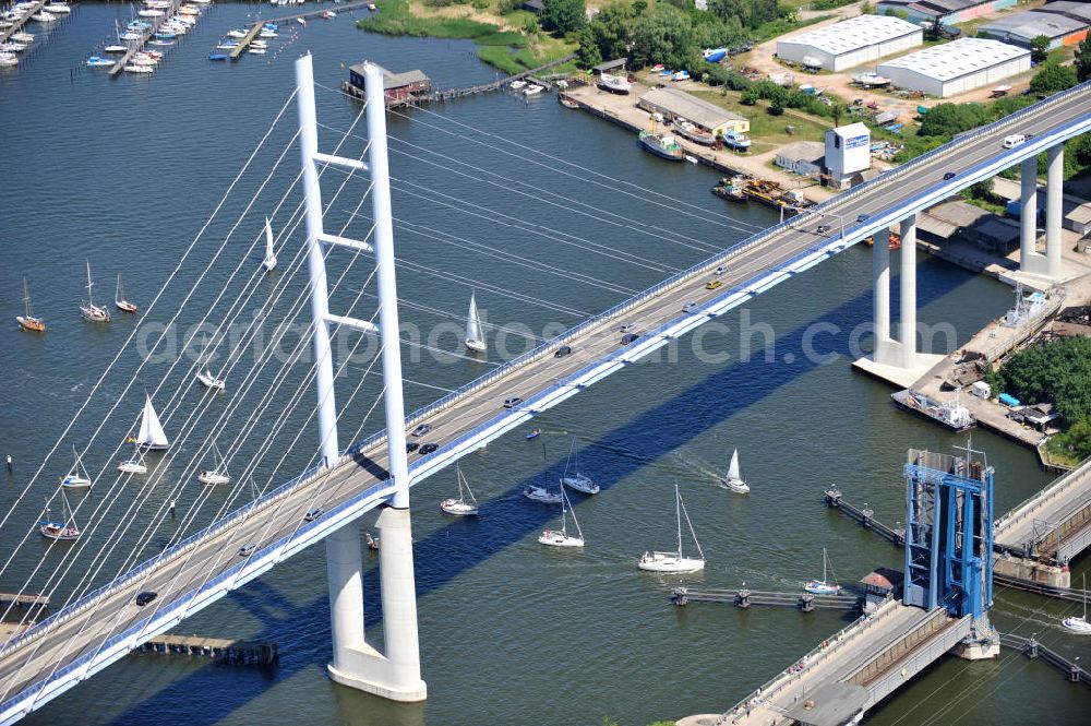 Hansestadt Stralsund from the bird's eye view: Blick auf die Strelasundquerung / Rügenbrücke mit Rügendamm vor der Stralsunder Altstadt. Im Auftrag des Bundesministeriums für Verkehr, Bau und Stadtentwicklung erfolgte die Planung und der Bau durch die Deutsche Einheit Fernstraßenplanungs- und -bau GmbH ( DEGES ). Die Bauausführung erfolgte durch die Arbeitsgemeinschaft 2.Strelasundquerung – MAX BÖGL-GMBH & Co.KG. Strelasund crossing / bridge to Rügen in Stralsund.