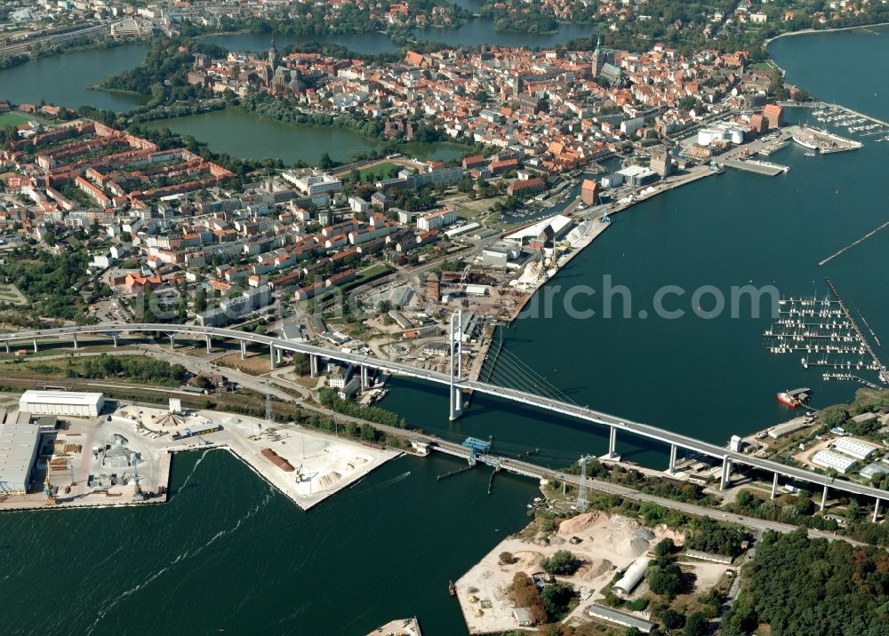 Stralsund from the bird's eye view: The Strelasund / Rügenbrücke with Rügendamm before Stralsund's old town in the state of Mecklenburg-Western Pomerania