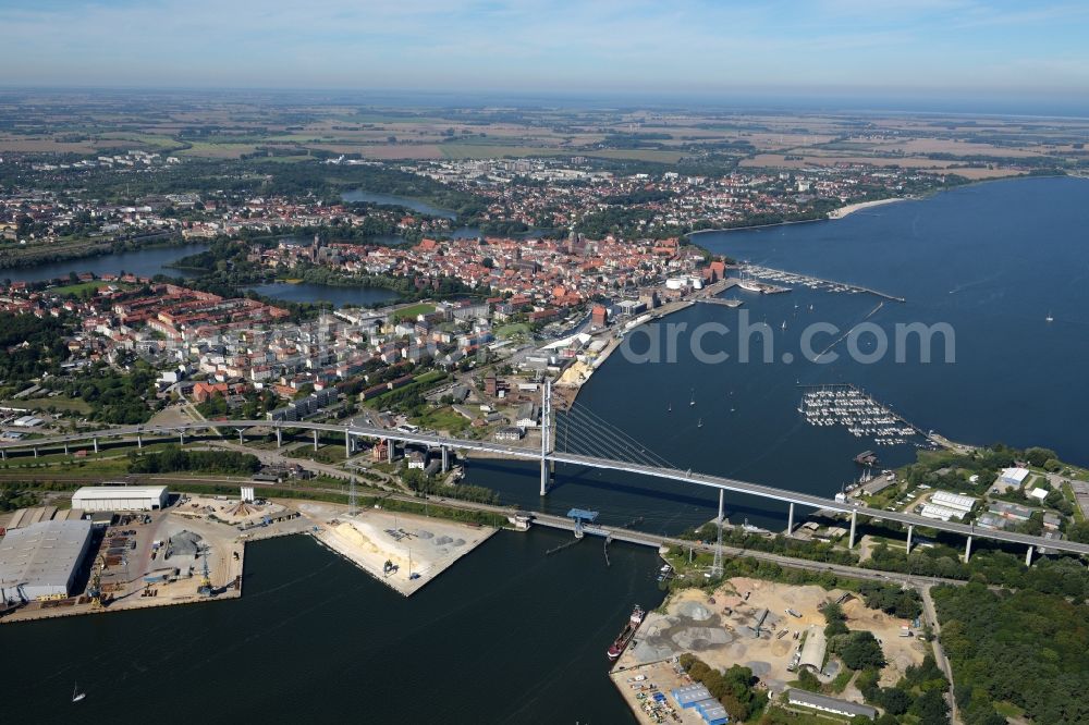 Stralsund from above - The Strelasund -Ruegenbruecke with Ruegendamm before Stralsund's old town in the state of Mecklenburg-Western Pomerania